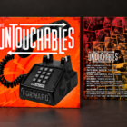 The Untouchables 7-inch record package showing the front sleeve with white vinyl partially exposed on the left and the full back-cover artwork alongside it.
